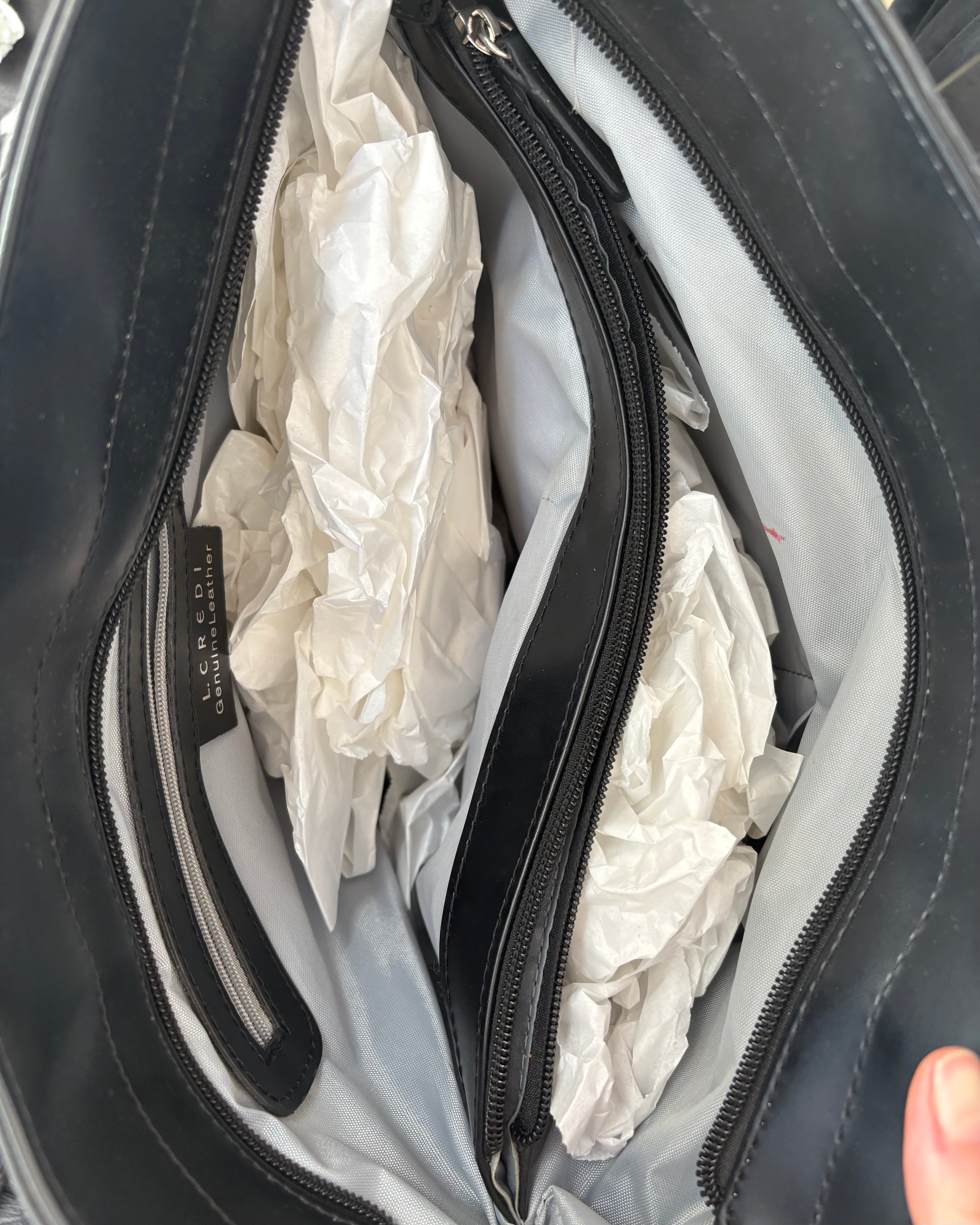 2010 Black Leather Handbag with Tassels